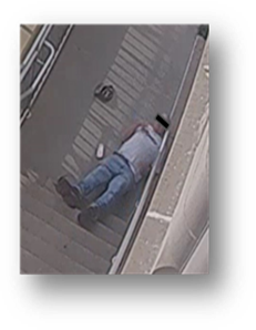 Injured man on stairs